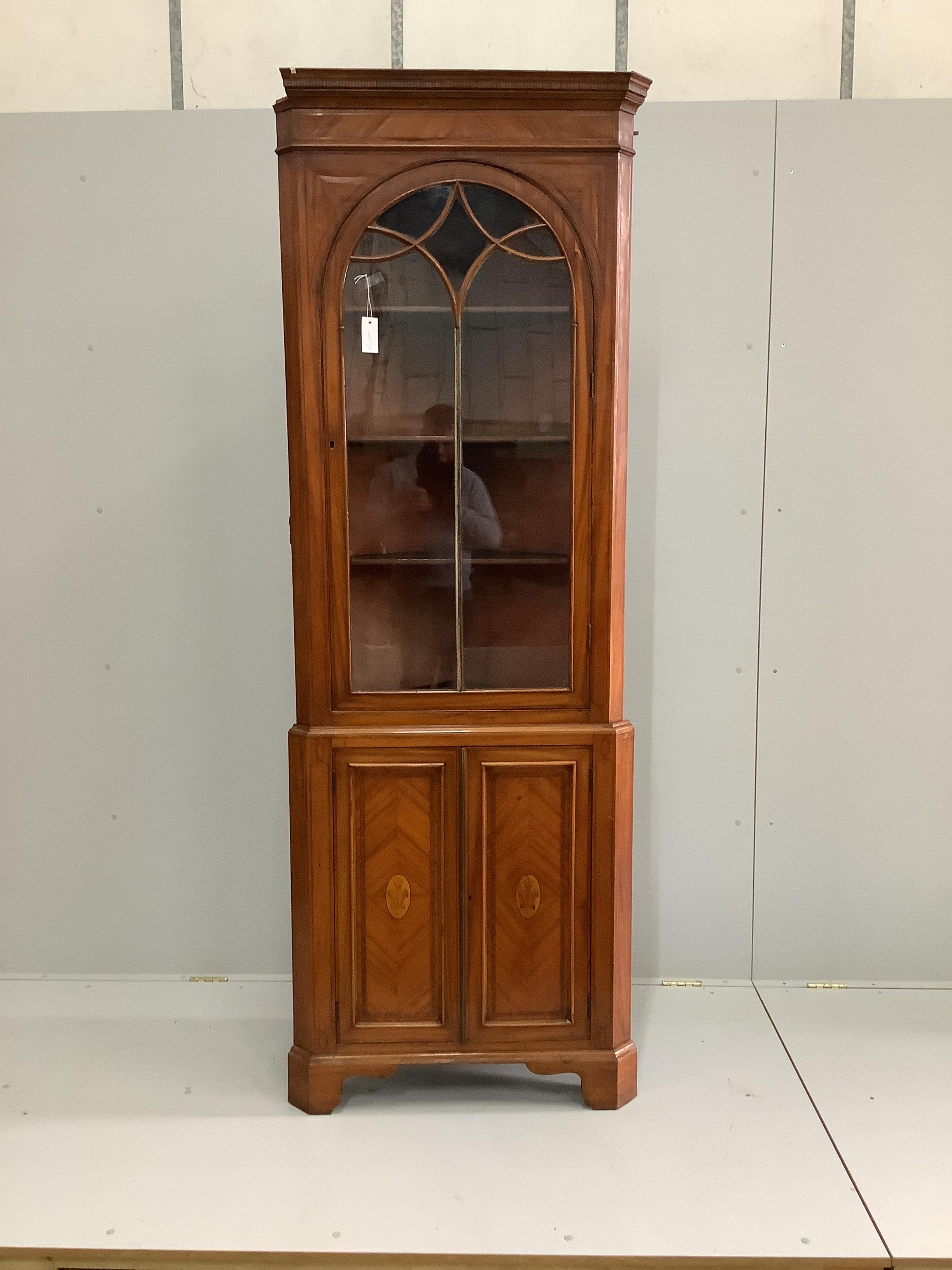 An Edwardian Sheraton revival inlaid satinwood standing corner cabinet, width 78cm, depth 40cm, height 223cm